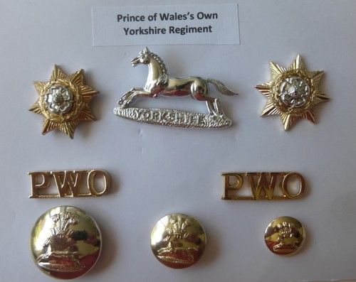 Cap collar badges titles - &,